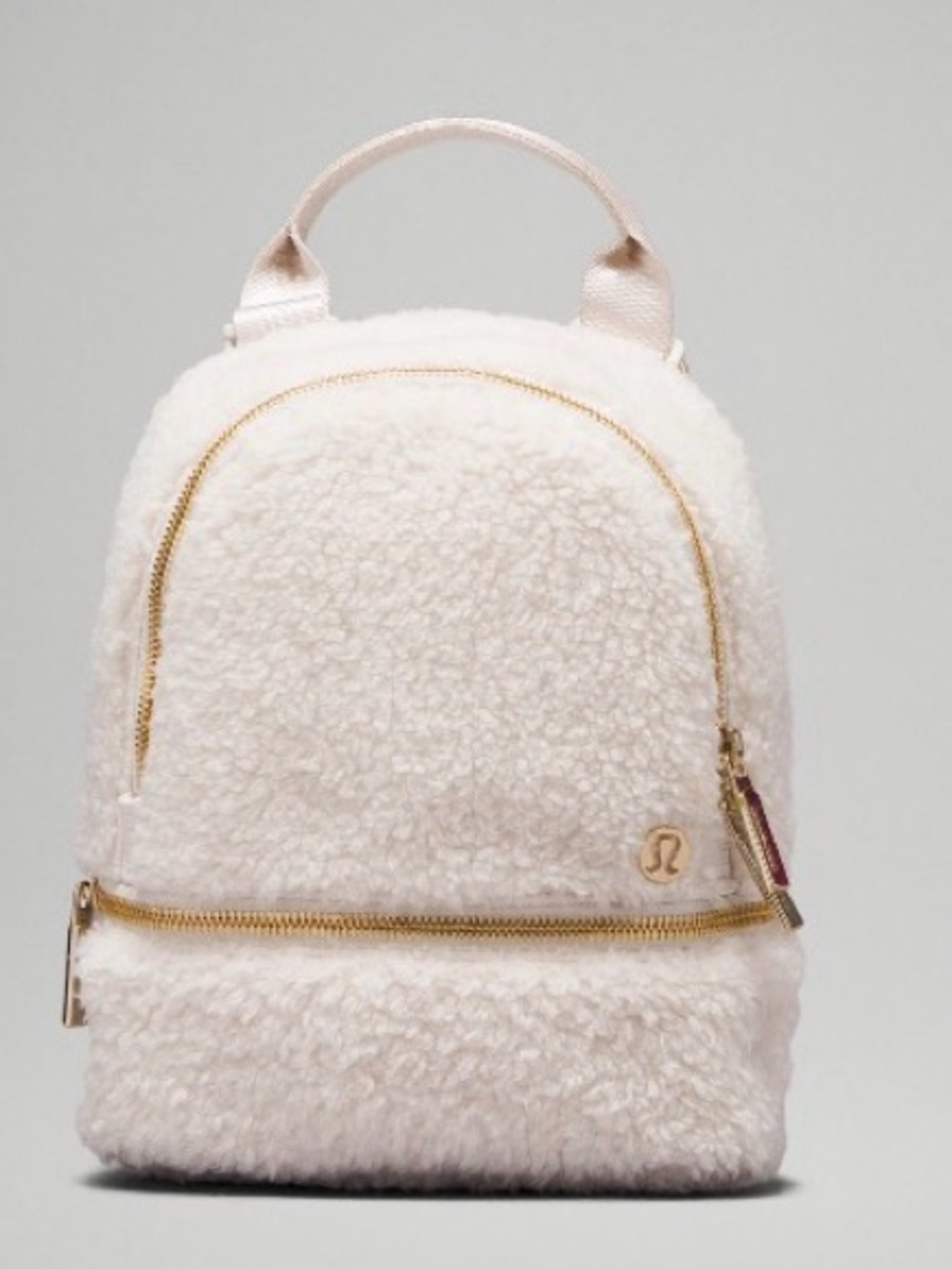 lululemon athletica Cream Faux-Sherpa Mini Backpack with Gold Hardware